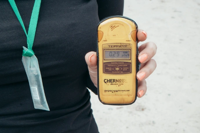 person holding yellow and black multimeter